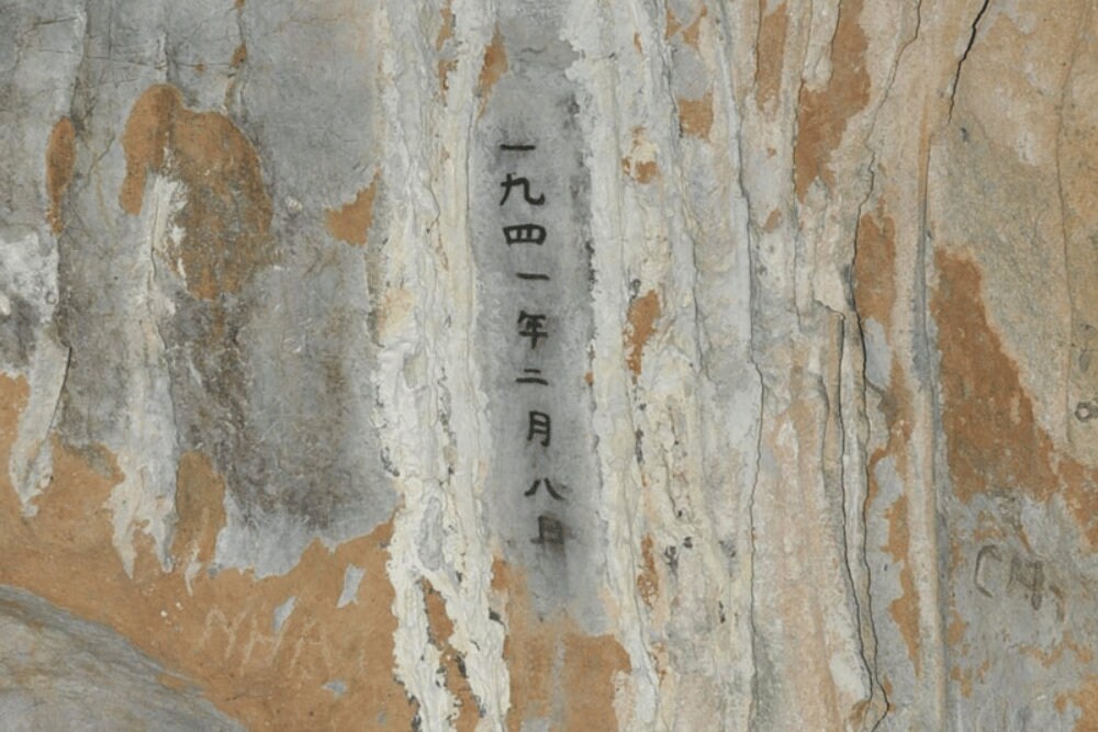 Visitors can still see Uncle Ho’s charcoal inscription marking the exact date he arrived at Coc Bo Cave in 1941